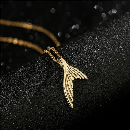 Gold Wolf Tooth Pendant Necklace with Devil's Eye Design